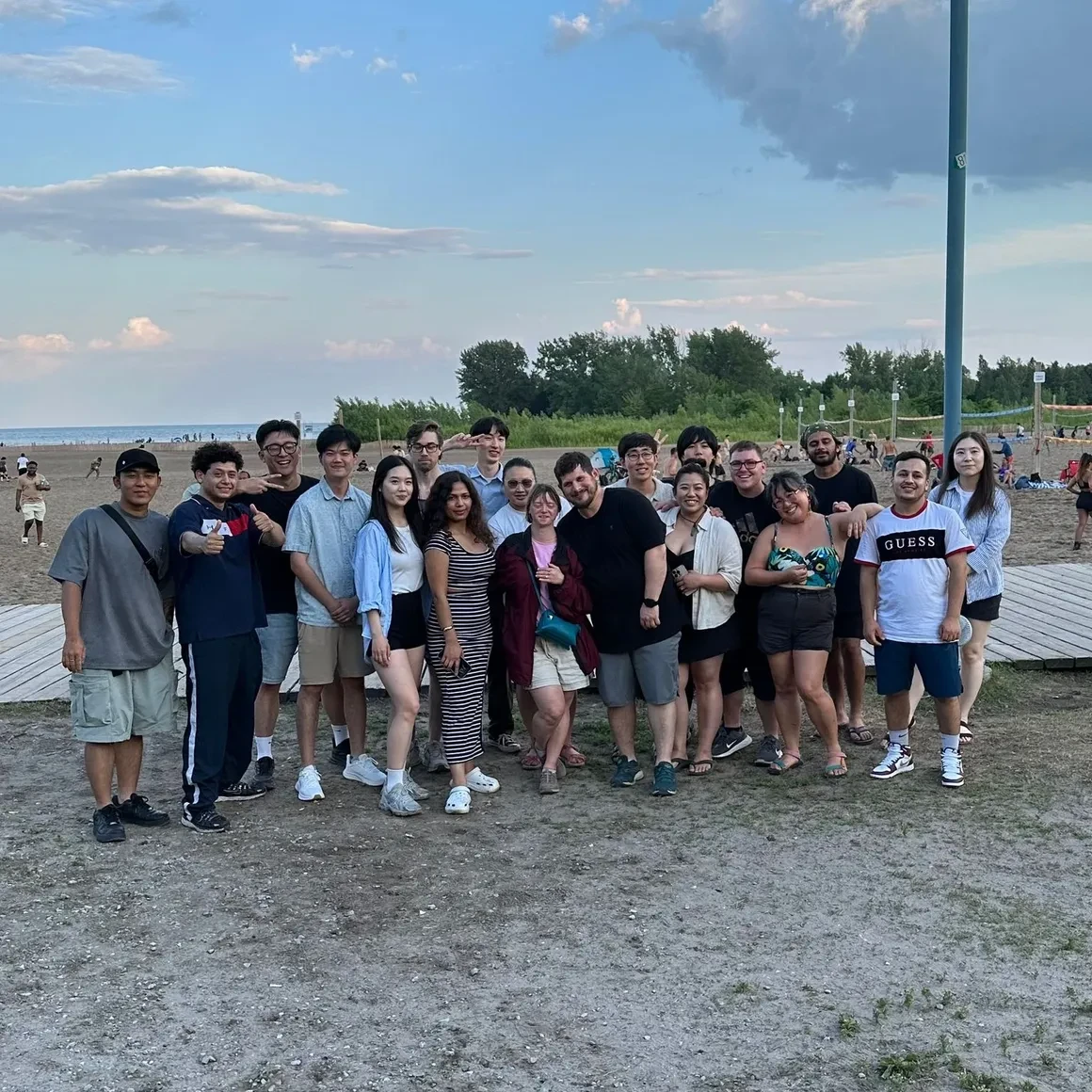 The Sarang Kitchen team and community gathered at the beach