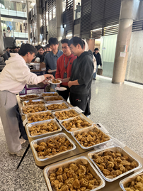 Sarang Kitchen catering event — guests being served